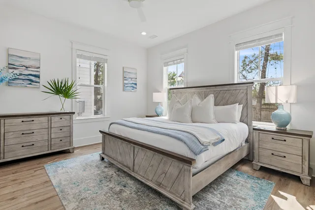 a bedroom with a bed and a cabinets