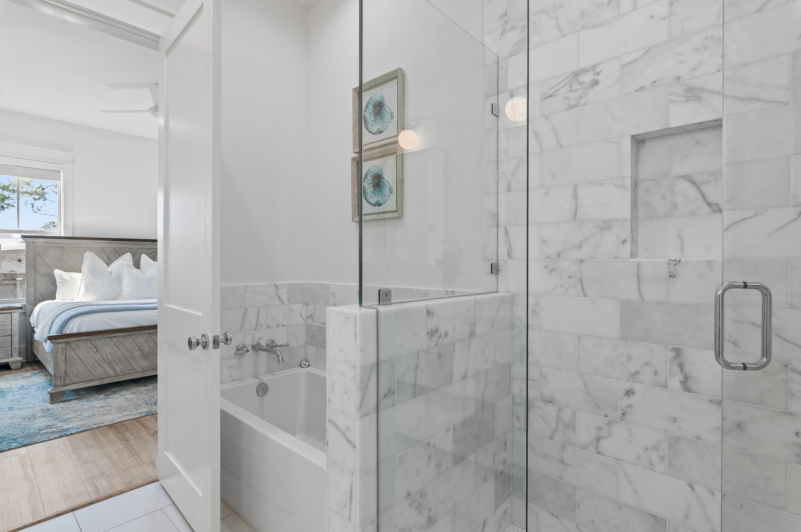 63 Sawgrass Lane Santa Rosa Beach, FL 32459 - Photo 16 of 51 a en suite bathroom with a shower