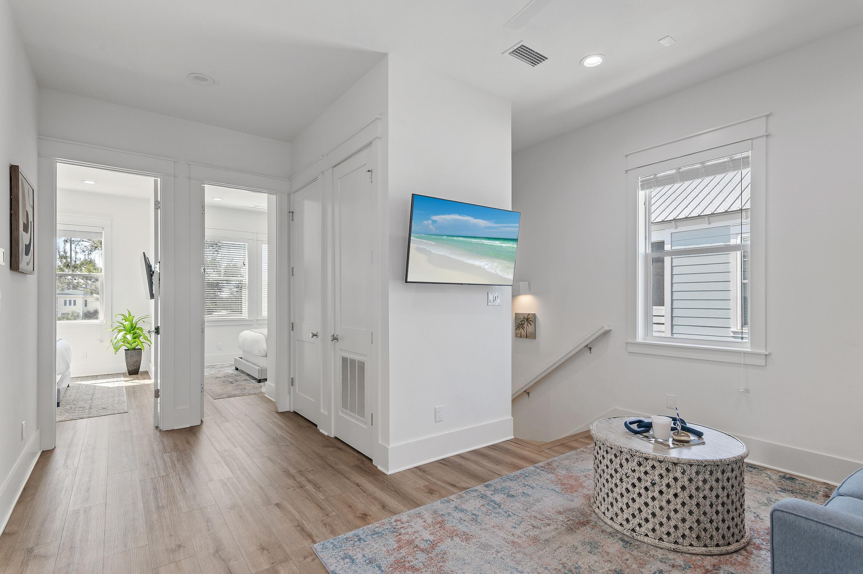 63 Sawgrass Lane Santa Rosa Beach, FL 32459 - Photo 18 of 51 a living room with furniture and wooden floor