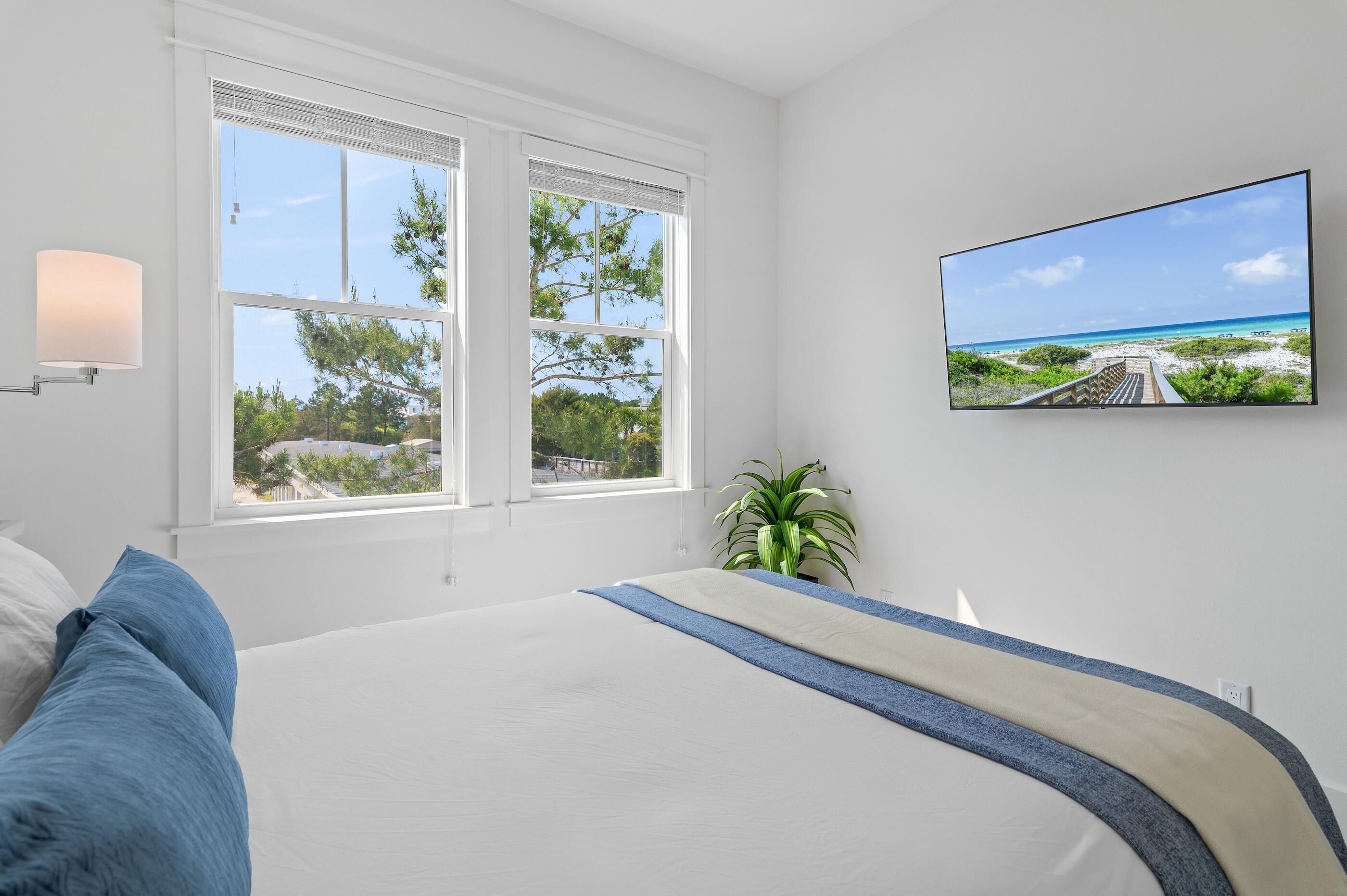 63 Sawgrass Lane Santa Rosa Beach, FL 32459 - Photo 25 of 51 a bed sitting in a bedroom next to a window