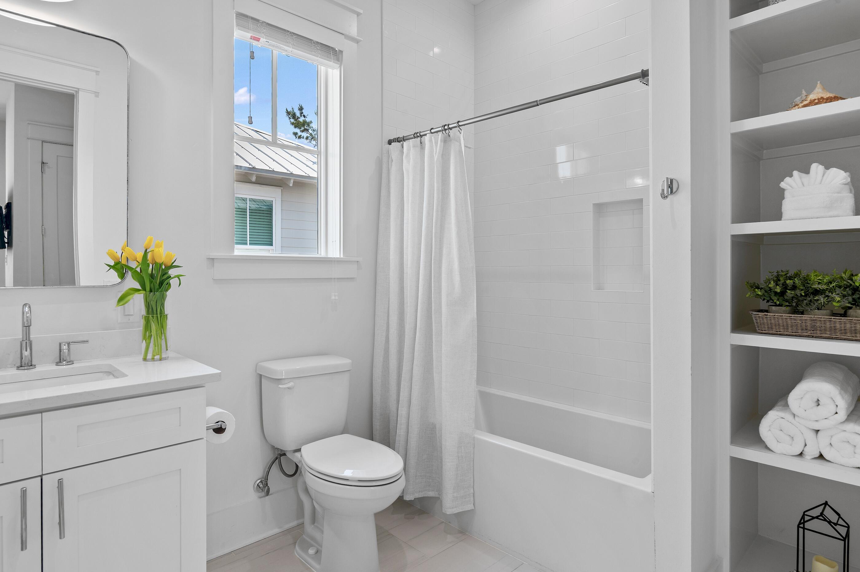 63 Sawgrass Lane Santa Rosa Beach, FL 32459 - Photo 26 of 51 a bathroom with a sink toilet and shower