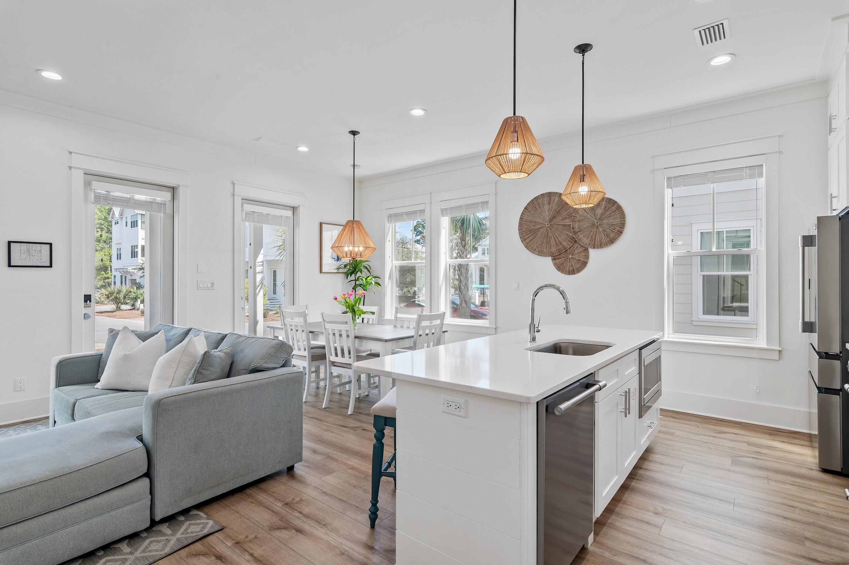 63 Sawgrass Lane Santa Rosa Beach, FL 32459 - Photo 10 of 51 a very nice looking room with a large window and chandelier