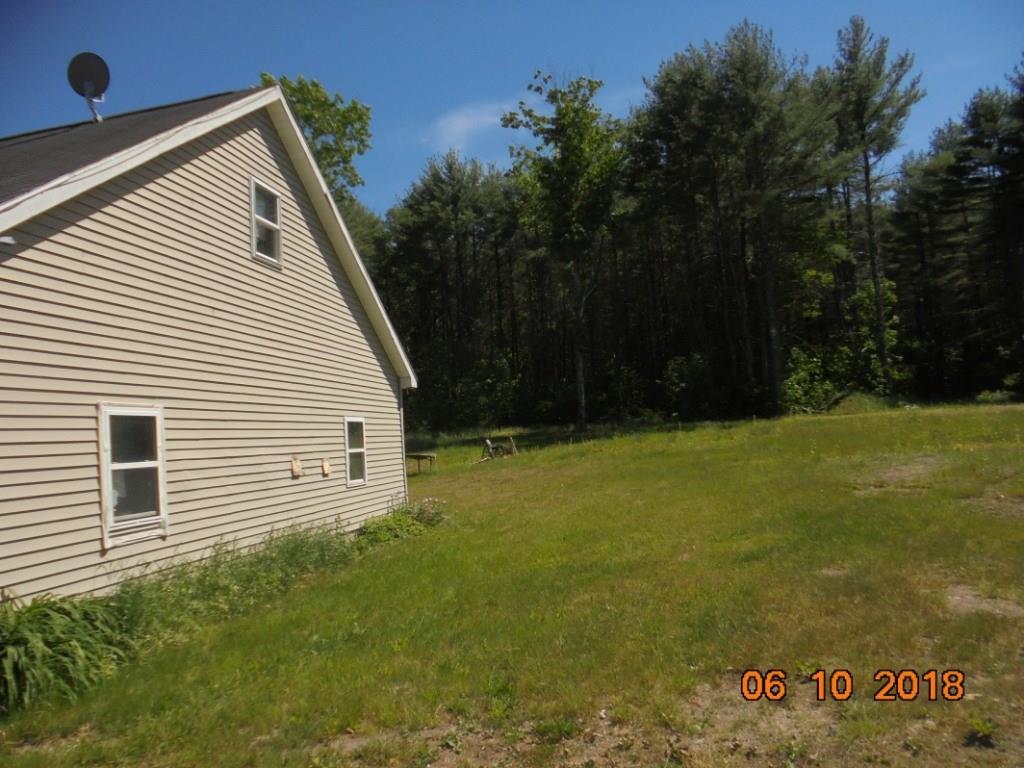 181 Troy Road Burnham, ME 04922 - Photo 12 of 13 Side of garage