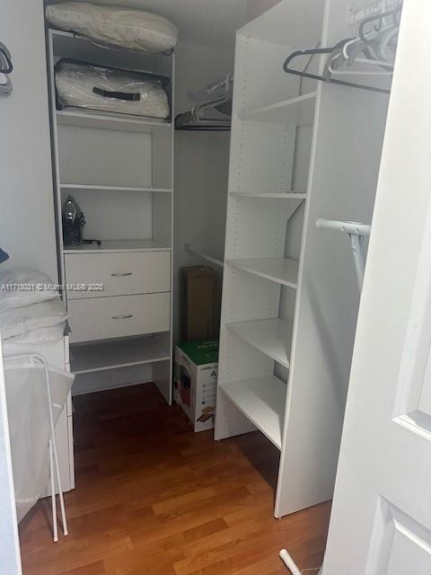 1250 South Miami Avenue, Unit 2013 Miami, FL 33130 - Photo 15 of 19 a view of walk in closet with empty racks