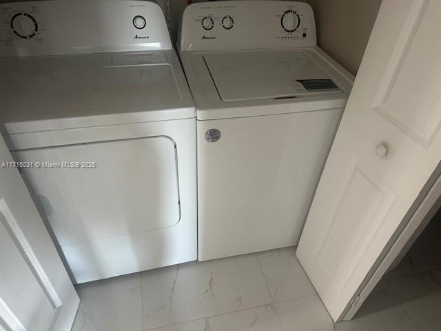 1250 South Miami Avenue, Unit 2013 Miami, FL 33130 - Photo 18 of 19 a utility room with dryer and washer