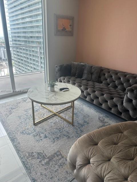 1250 South Miami Avenue, Unit 2013 Miami, FL 33130 - Photo 8 of 19 a living room with furniture and a window