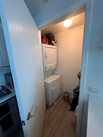 a front view of a cabinet and a mirror