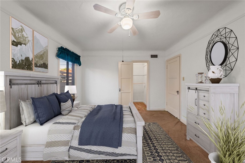 3754 California Long Beach, CA 90807 - Photo 18 of 38 a bedroom with furniture and a mirror