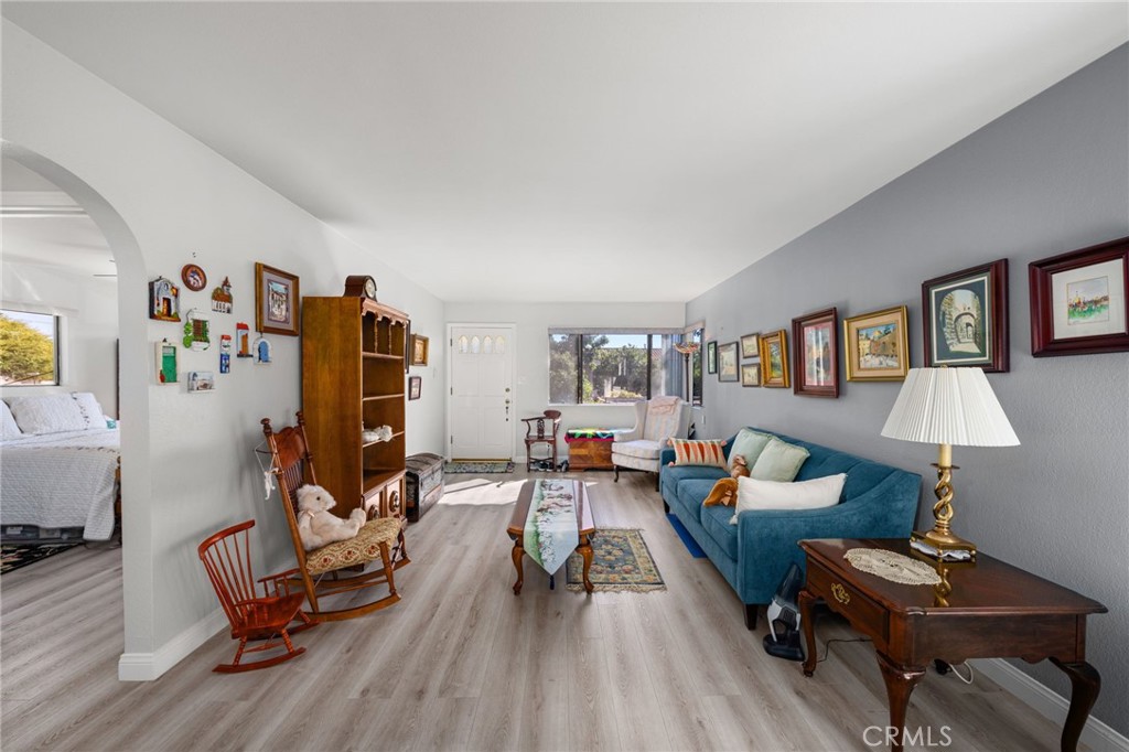 3754 California Long Beach, CA 90807 - Photo 24 of 38 a living room with furniture and a wooden floor