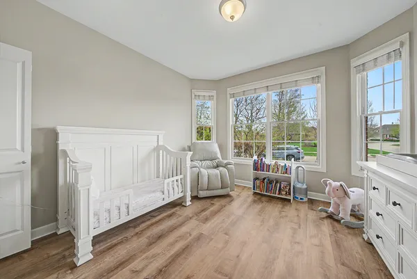 a living room with furniture and windows