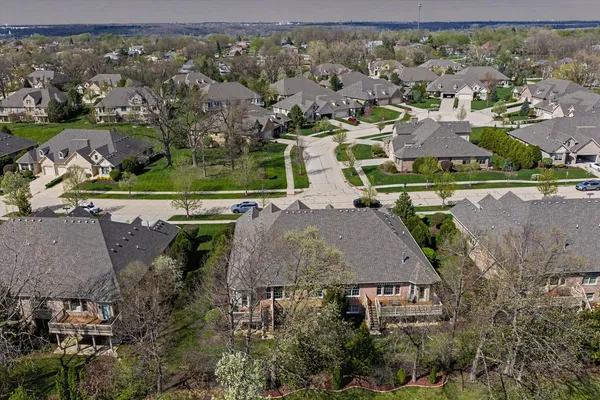 an aerial view of a house with a garden