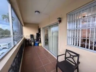 a view of a hallway with living room