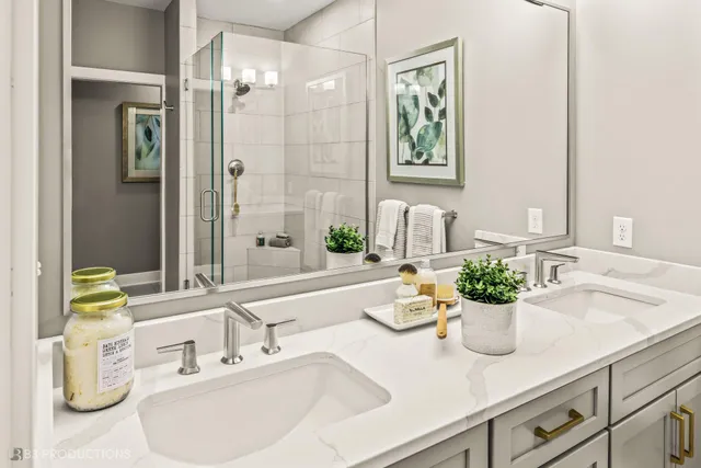 a bathroom with a sink a mirror and a window