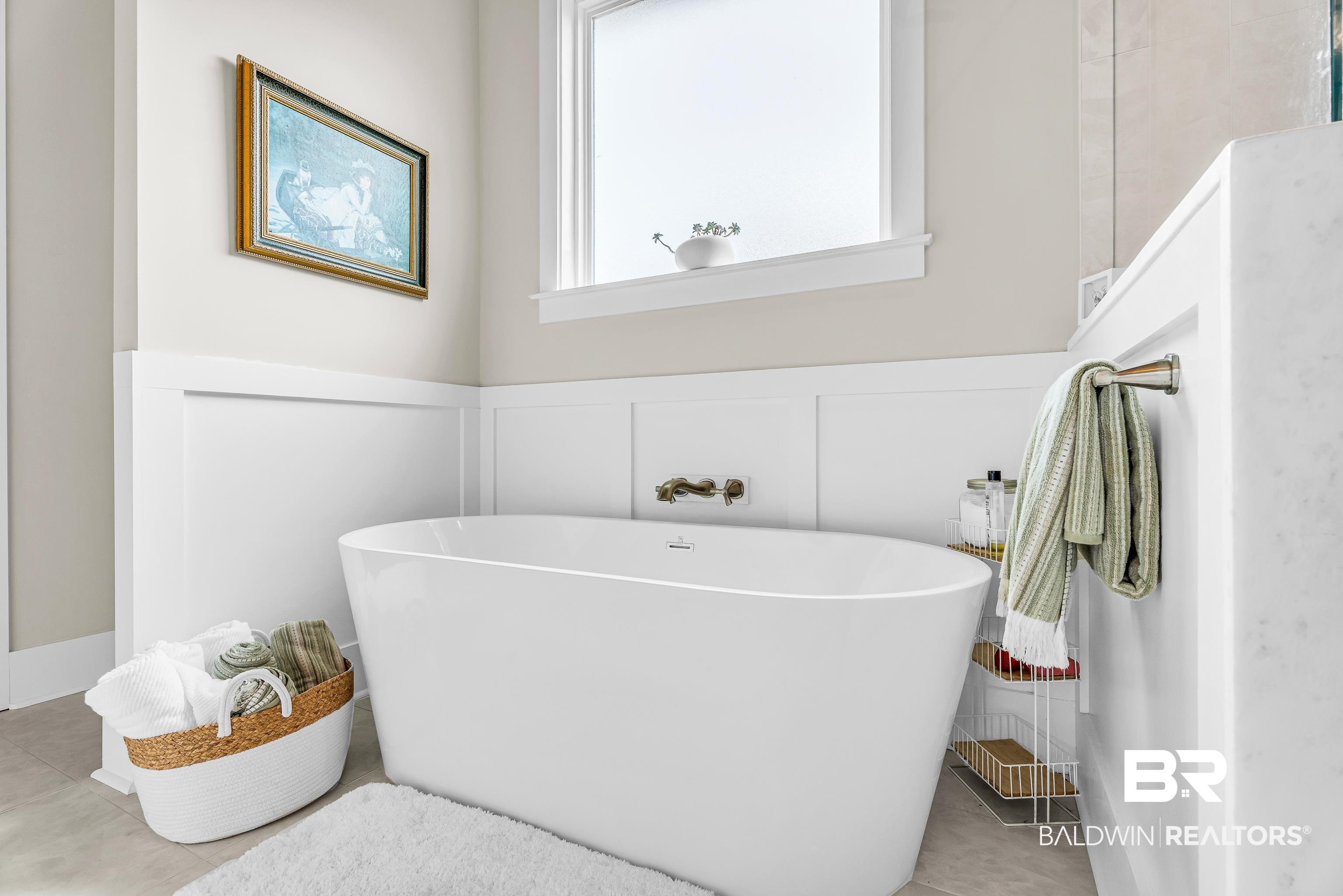 17541 Polo Ridge Boulevard Fairhope, AL 36532 - Photo 14 of 19 Freestanding soaking tub with a wall-mounted brass fixture