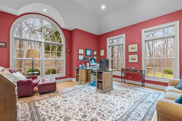 a living room with furniture or couch and a large window