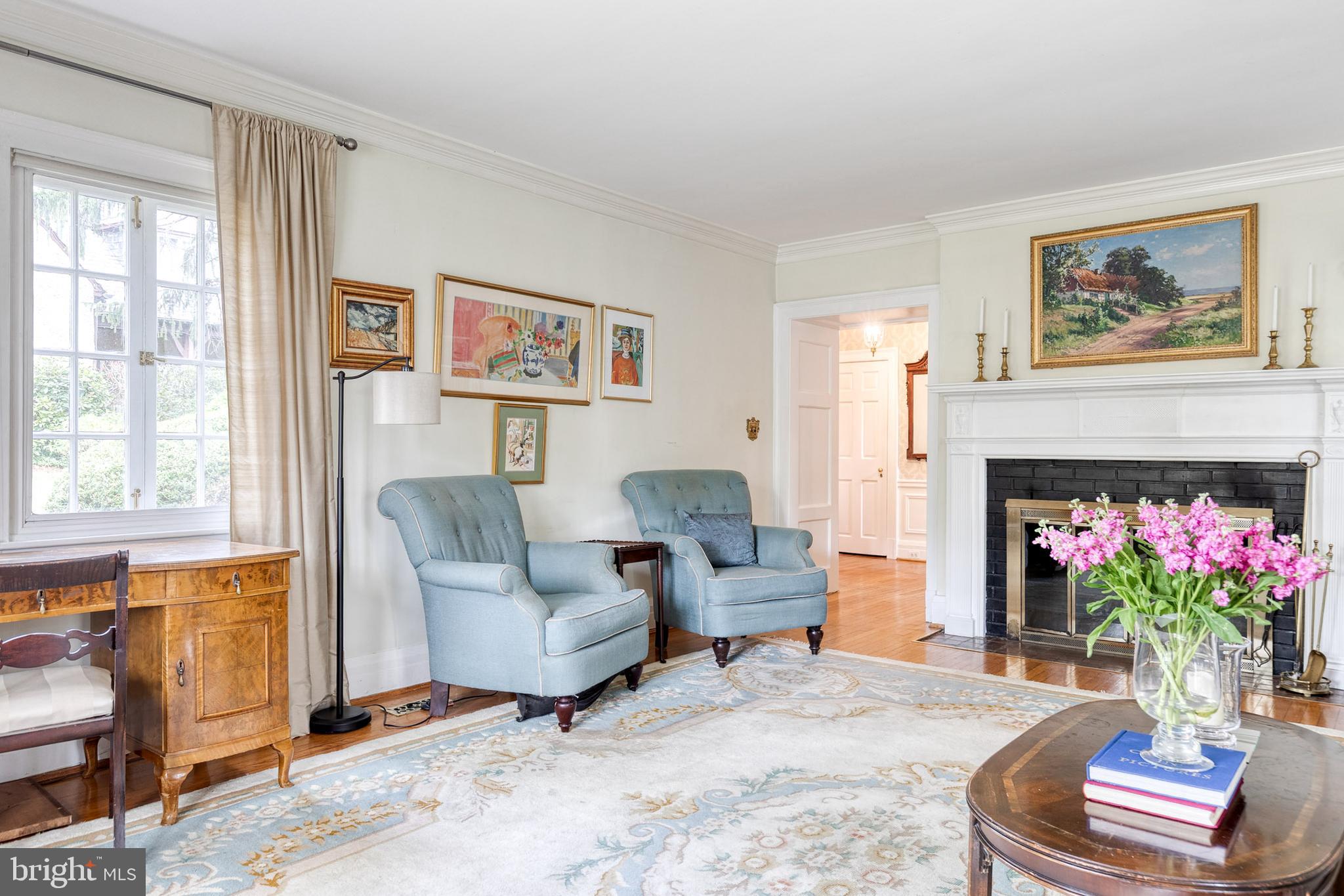 202 Taplow Road Baltimore, MD 21212 - Photo 12 of 56 a living room with furniture and a fireplace