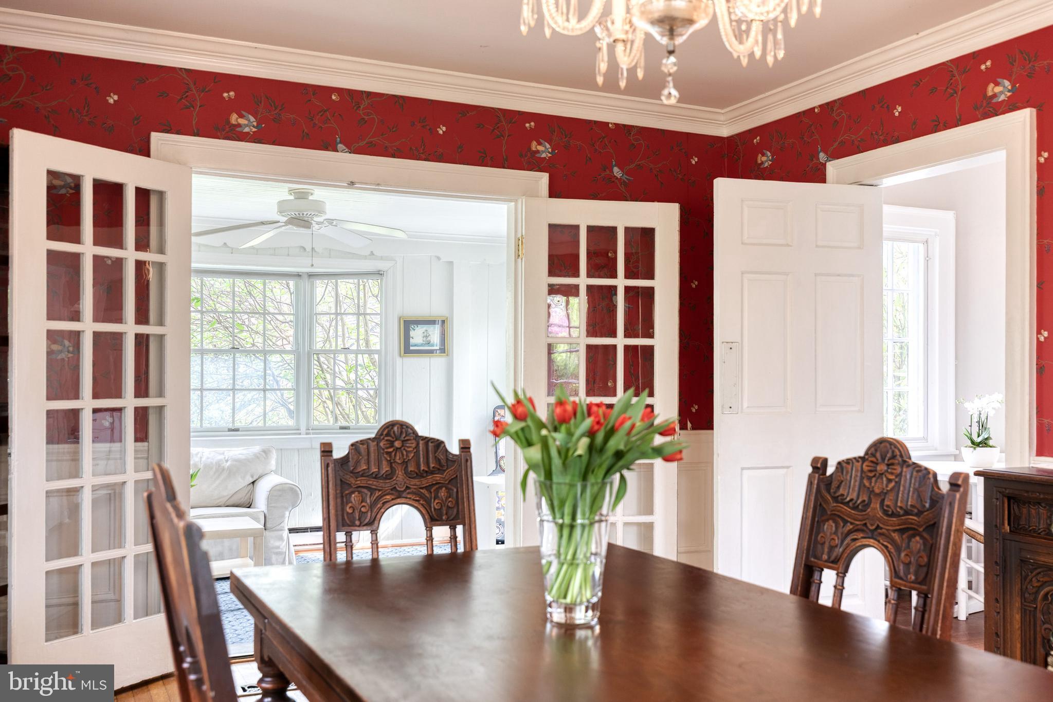 202 Taplow Road Baltimore, MD 21212 - Photo 20 of 56 a view of a dining room with furniture window and wooden floor