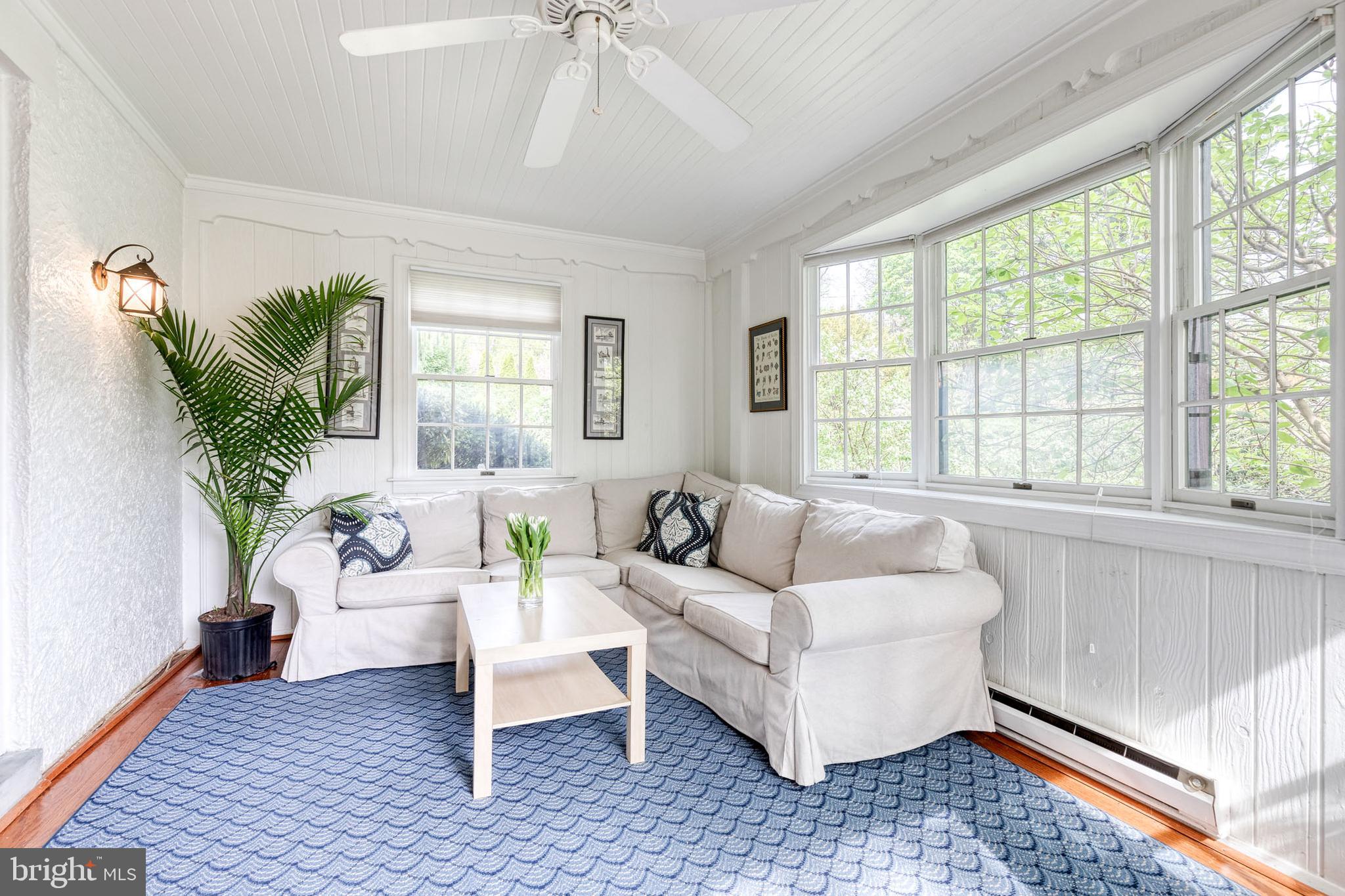 202 Taplow Road Baltimore, MD 21212 - Photo 25 of 56 a living room with furniture and a large window