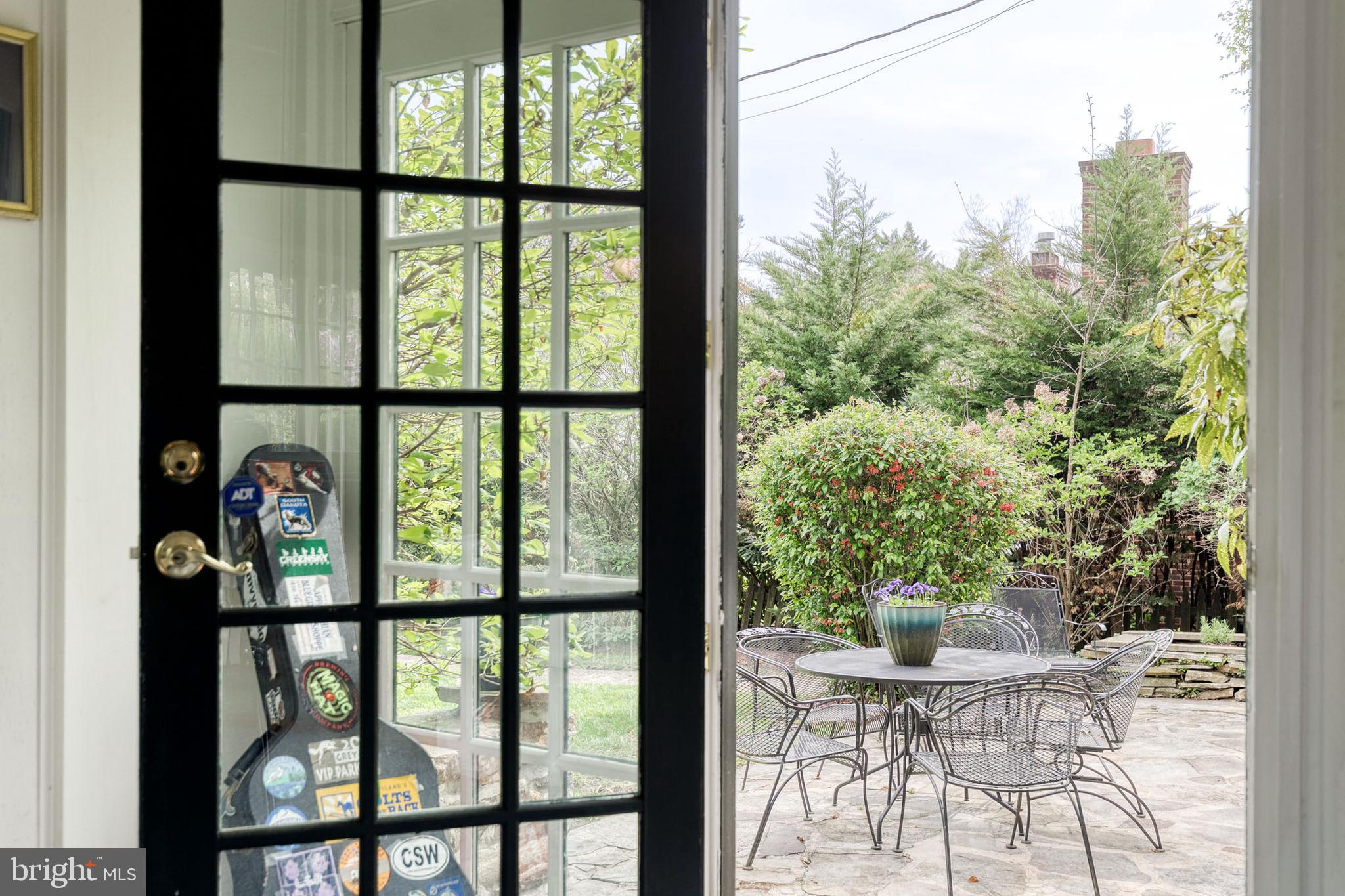 202 Taplow Road Baltimore, MD 21212 - Photo 28 of 56 a view of a dining room with furniture window and outside view
