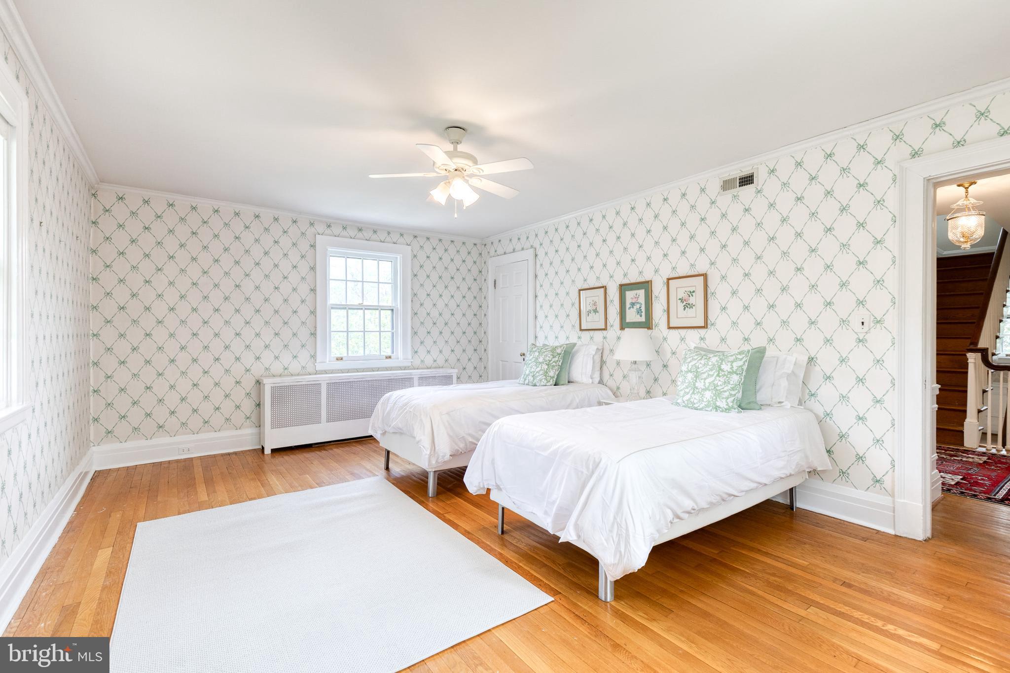 202 Taplow Road Baltimore, MD 21212 - Photo 35 of 56 a bedroom with a large bed and a window