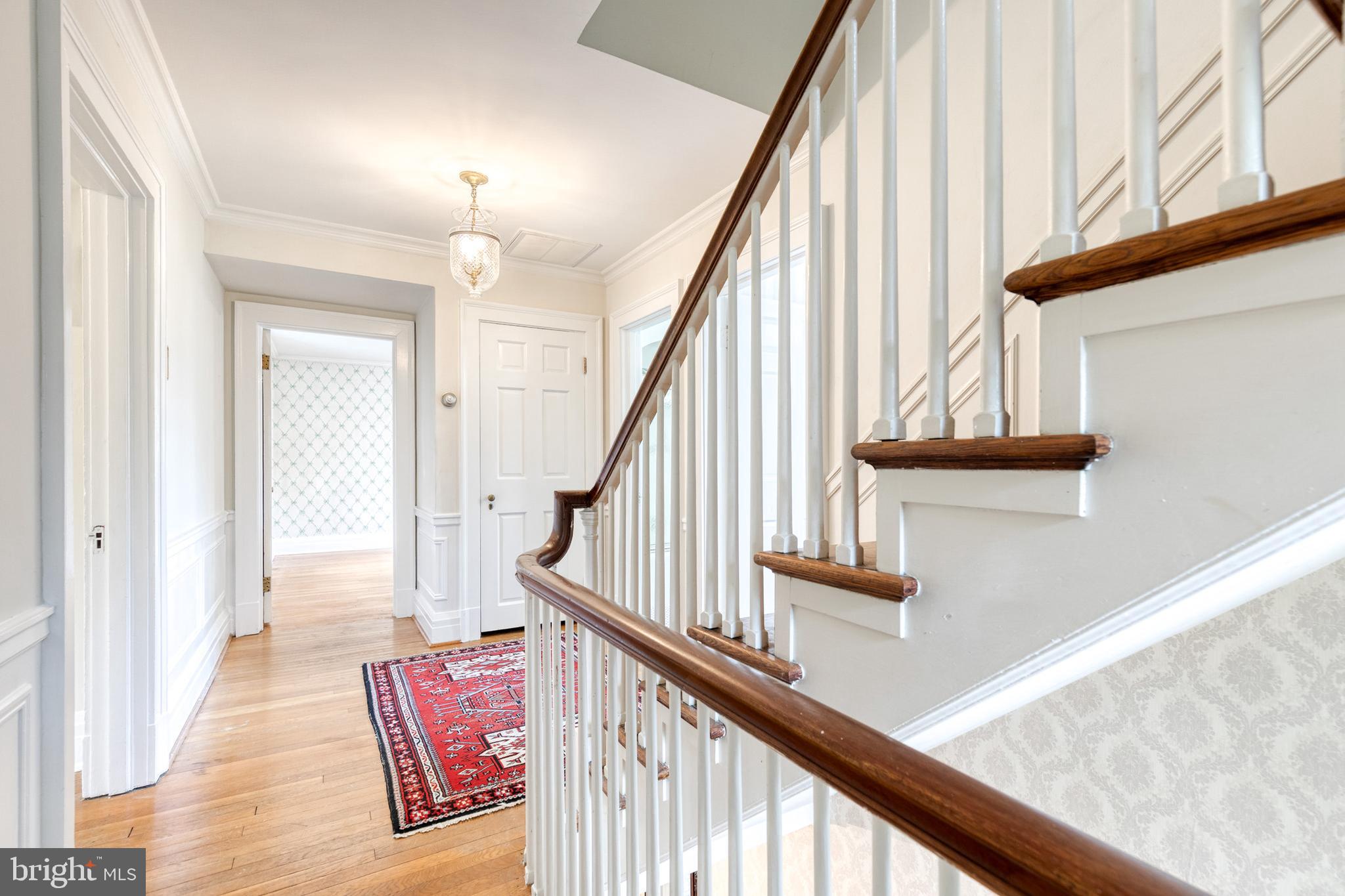202 Taplow Road Baltimore, MD 21212 - Photo 39 of 56 a view of entryway with wooden floor and stairs