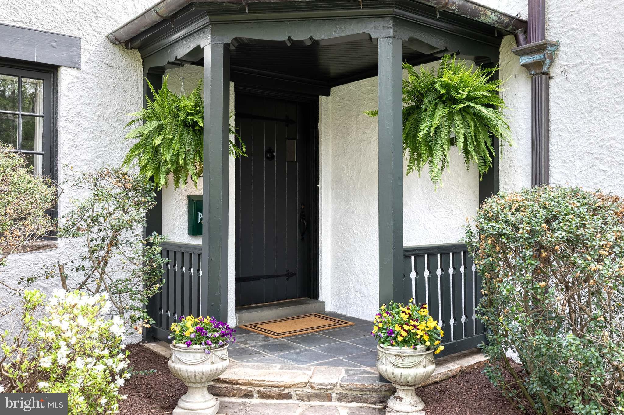 202 Taplow Road Baltimore, MD 21212 - Photo 4 of 56 a view of a potted plants in front of a house