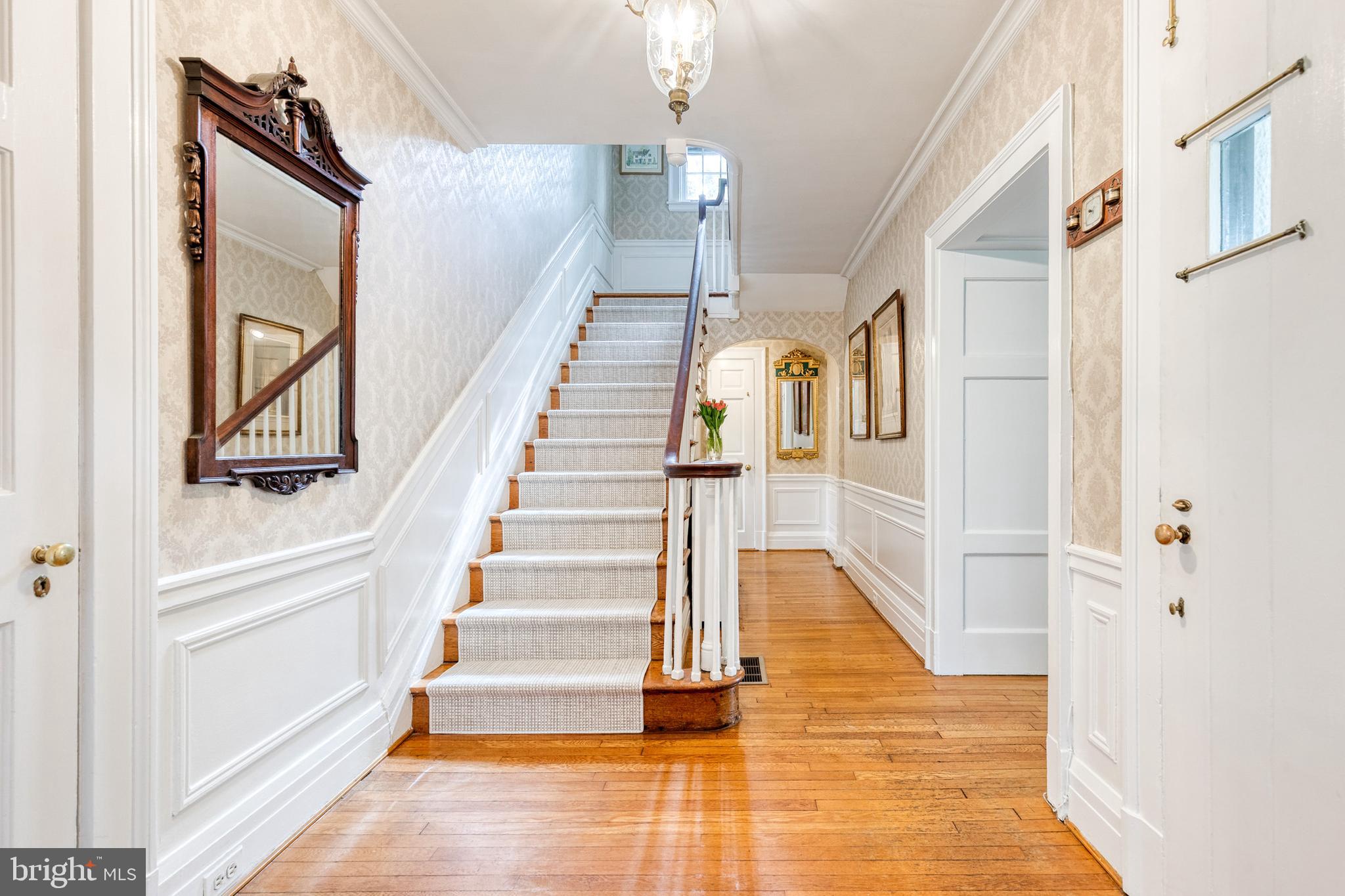 202 Taplow Road Baltimore, MD 21212 - Photo 6 of 56 a view of entryway and hall with wooden floor
