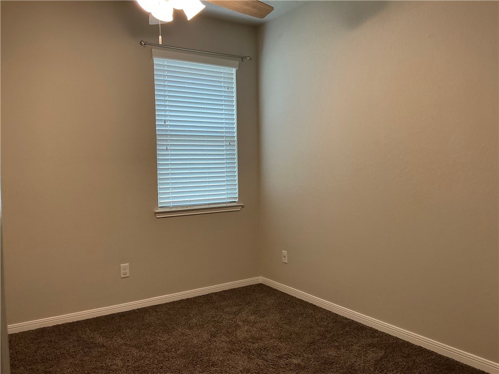 3896 Still Creek Loop College Station, TX 77845 - Photo 12 of 19 an empty room with a window
