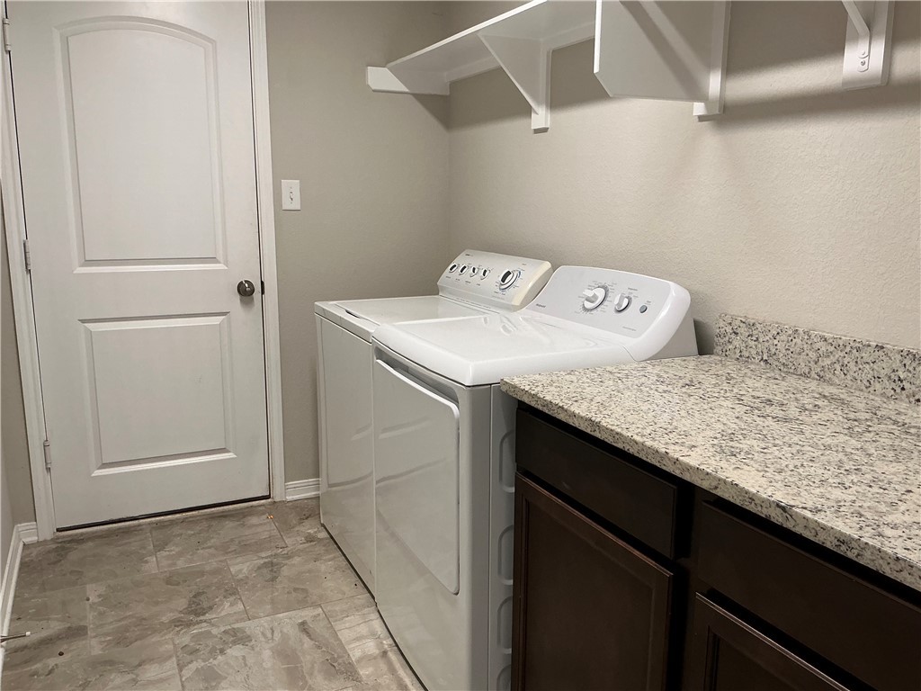 3896 Still Creek Loop College Station, TX 77845 - Photo 15 of 19 a utility room with washer and dryer
