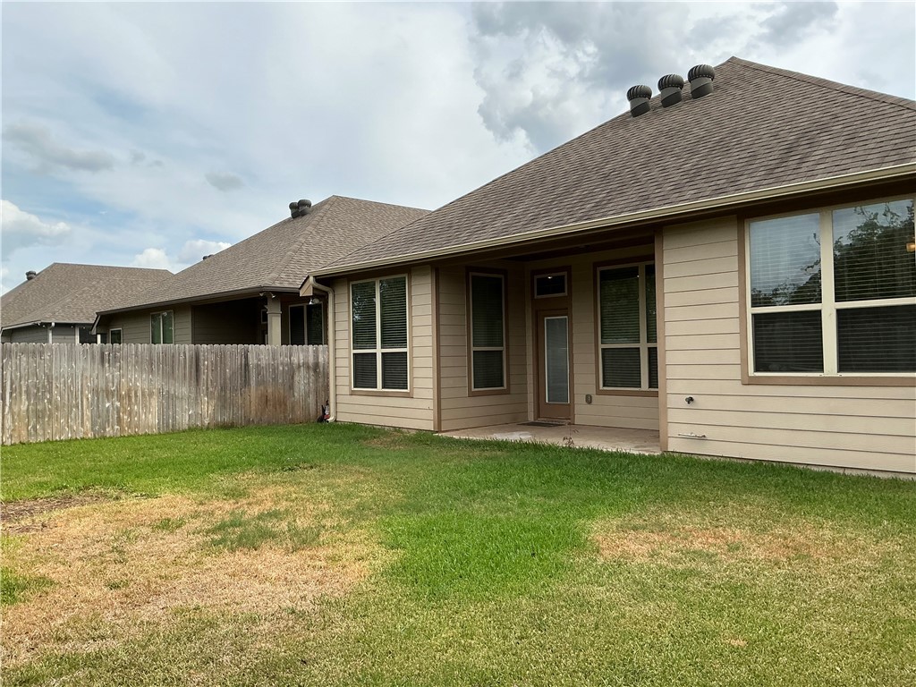 3896 Still Creek Loop College Station, TX 77845 - Photo 17 of 19 a view of a back yard of the house