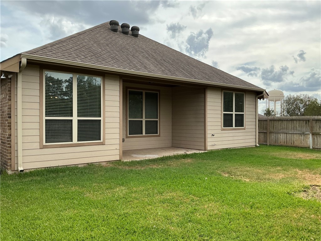 3896 Still Creek Loop College Station, TX 77845 - Photo 18 of 19 a house view with a garden space