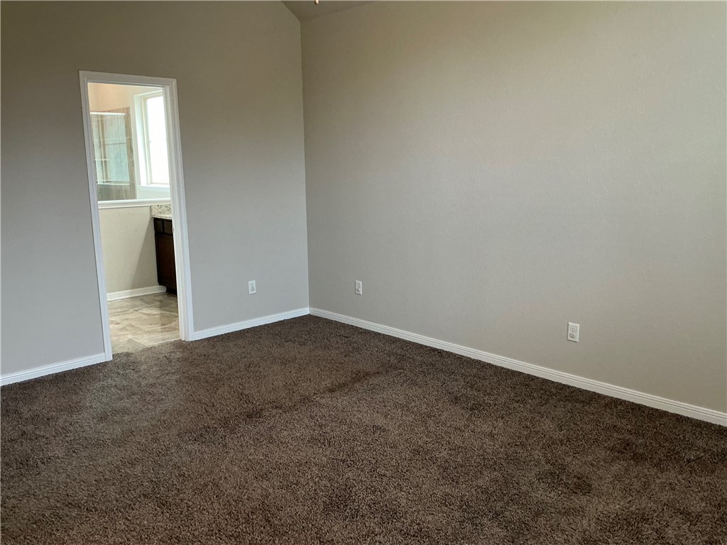 3896 Still Creek Loop College Station, TX 77845 - Photo 5 of 19 an empty room with windows