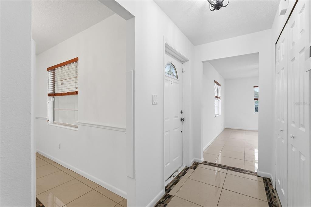 4848 Judy Ann Court Orlando, FL 32808 - Photo 14 of 39 a view of a hallway