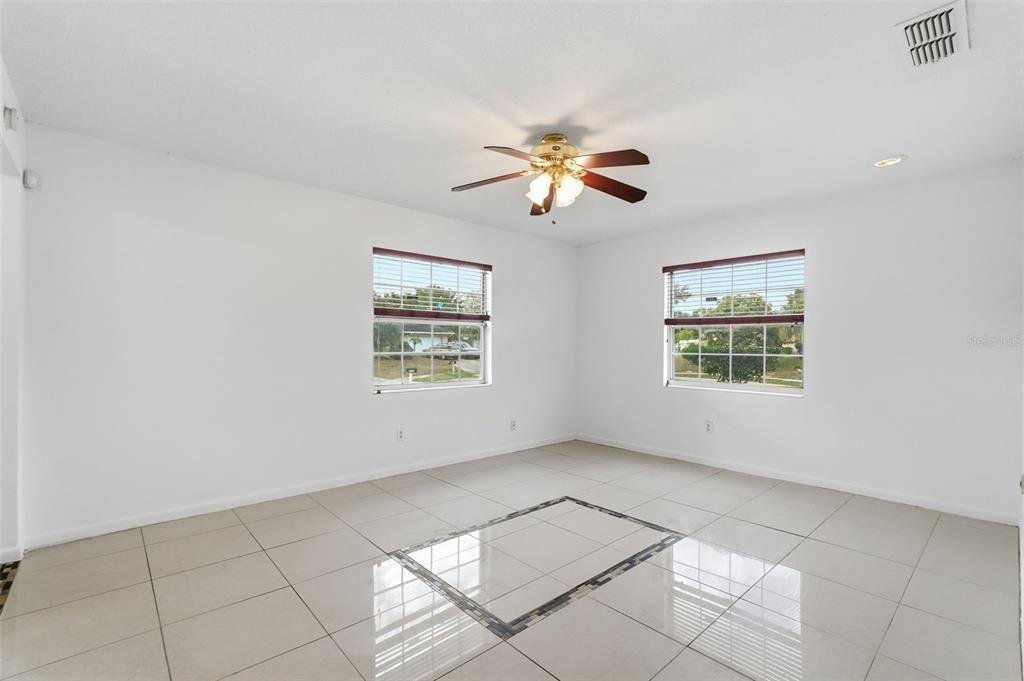 4848 Judy Ann Court Orlando, FL 32808 - Photo 18 of 39 a view of an empty room with a window