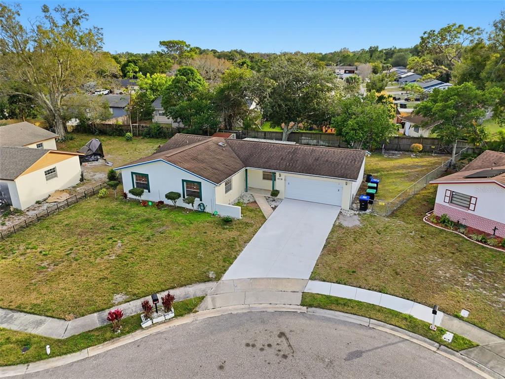 4848 Judy Ann Court Orlando, FL 32808 - Photo 3 of 39 an aerial view of a house with garden space and street view