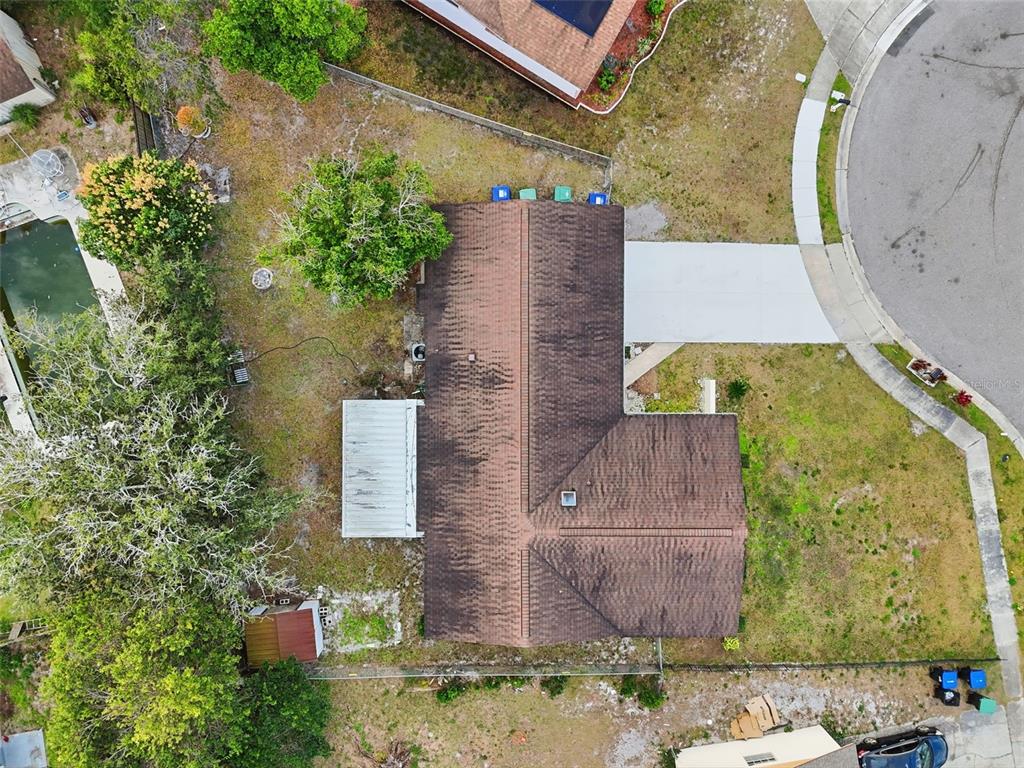 4848 Judy Ann Court Orlando, FL 32808 - Photo 39 of 39 an aerial view of a house with a yard