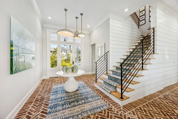 a spacious bedroom with a bed and a couch