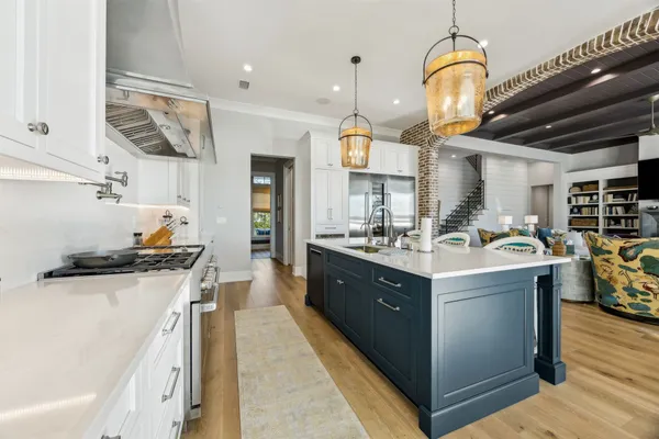 a living room with furniture fireplace and flat screen tv