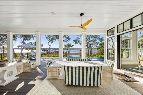 a spacious bedroom with a bed and a window