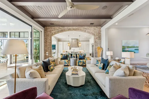 a bed room with a bed and a large window