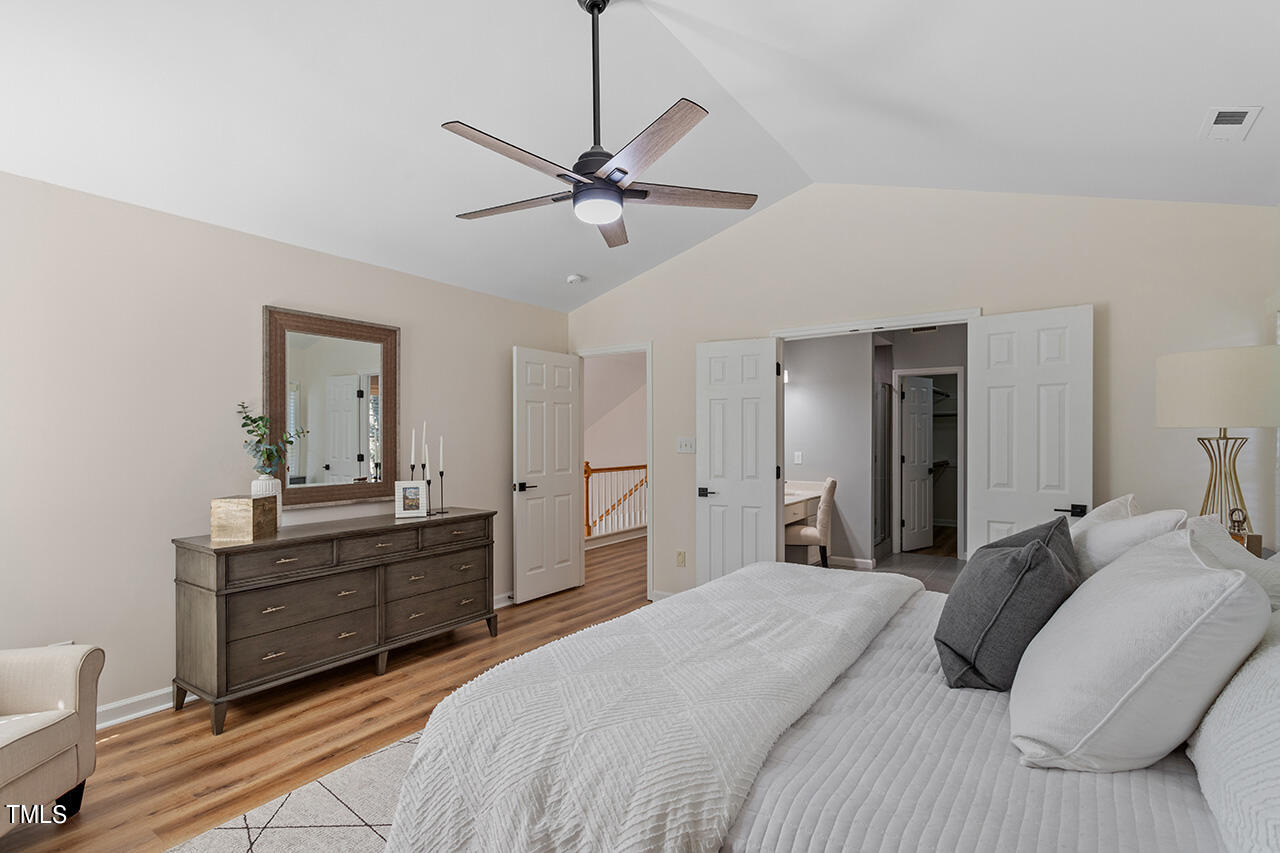 9004 Admaston Drive Raleigh, NC 27613 - Photo 20 of 30 The primary bedroom is located on one side upstairs, separated from the other 3 bedrooms.