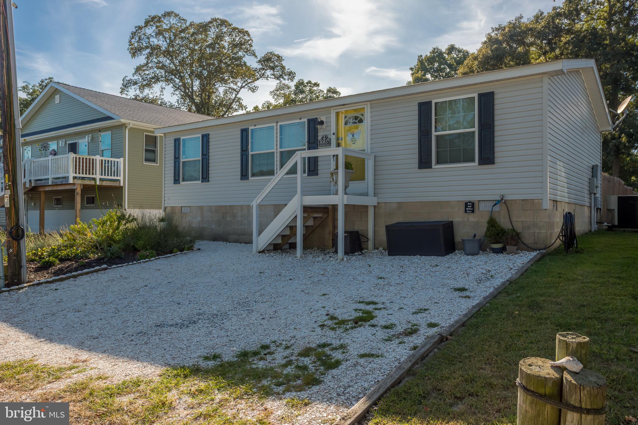 30837 West Lagoon Road Dagsboro, DE 19939 - Photo 2 of 36 Charming home with inviting curb appeal.