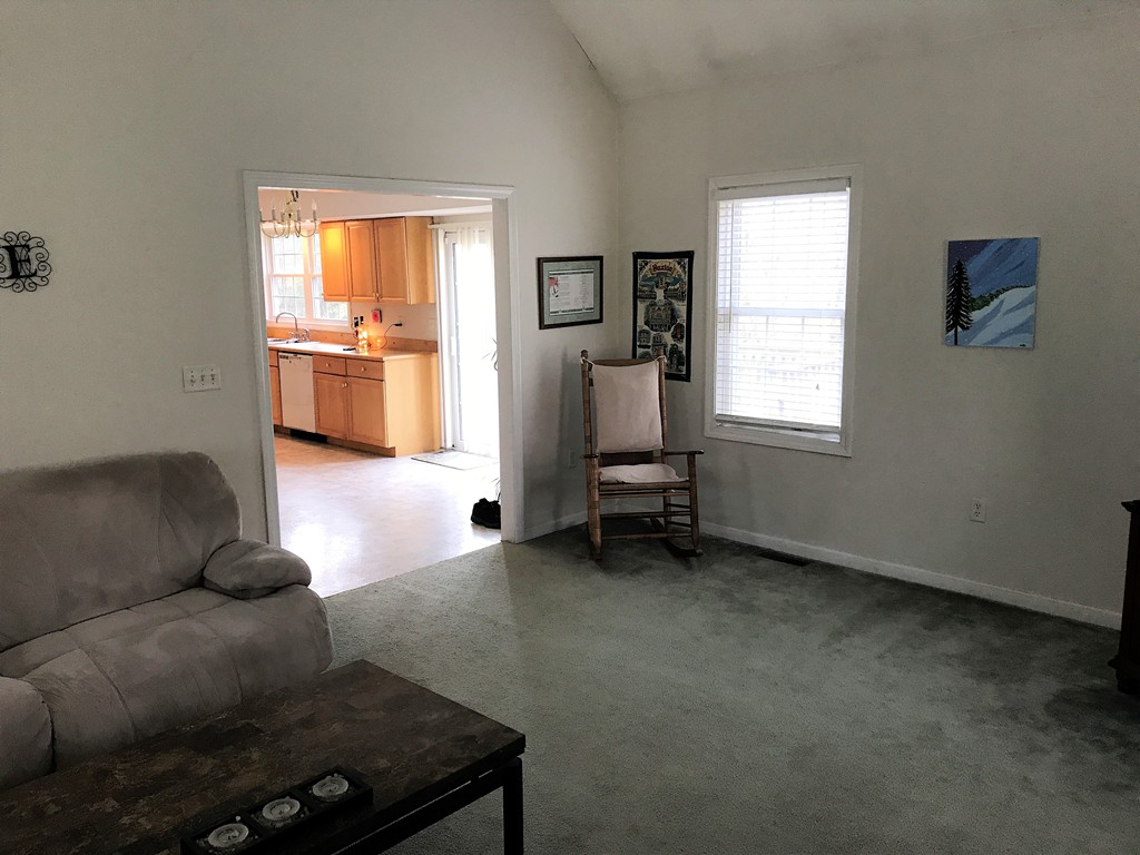 380 Richardson Road Dracut, MA 01826 - Photo 12 of 21 a living room with furniture and a window