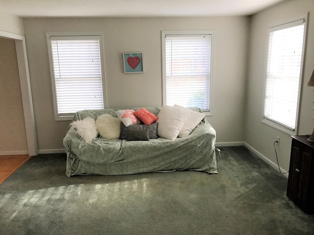380 Richardson Road Dracut, MA 01826 - Photo 13 of 21 a living room with furniture and a window