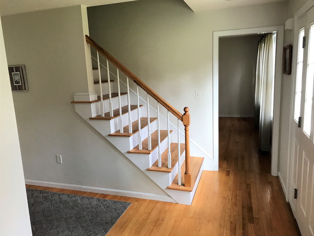380 Richardson Road Dracut, MA 01826 - Photo 16 of 21 a view of entryway and hall with wooden floor