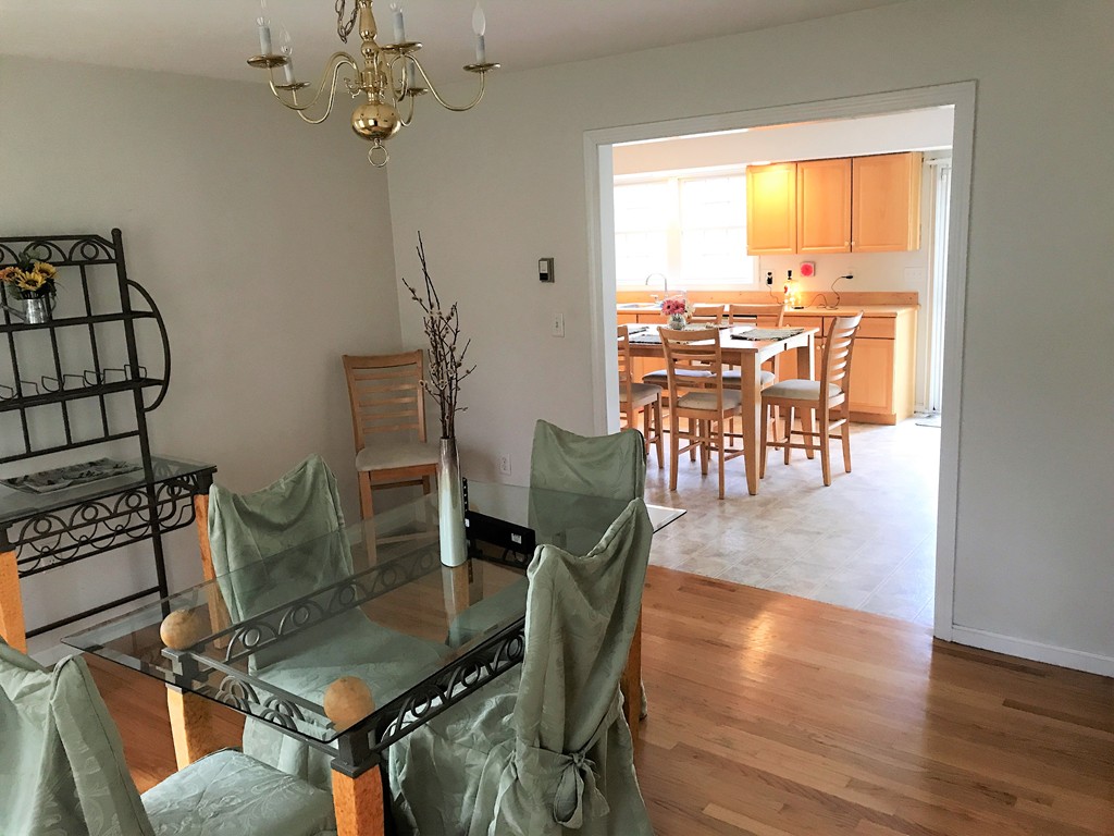 380 Richardson Road Dracut, MA 01826 - Photo 9 of 21 a view of a dining room with furniture window and wooden floor