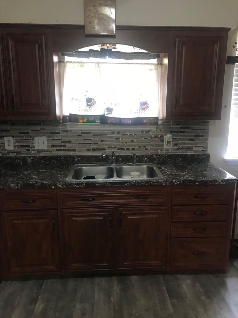 2907 Anderson Road Nashville, TN 37217 - Photo 11 of 12 a kitchen with a sink and cabinets