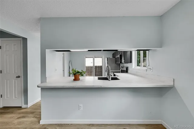 a view of living room with furniture and window