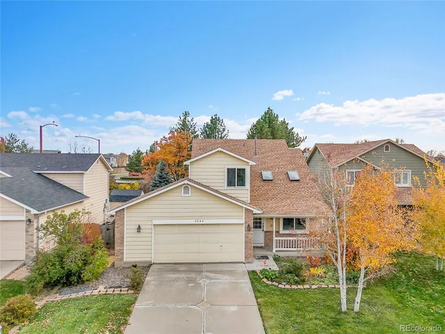 a view of house with garden