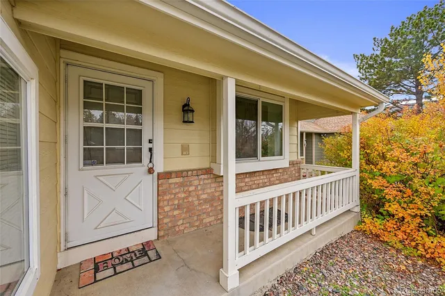 a view of porch with a small cabin